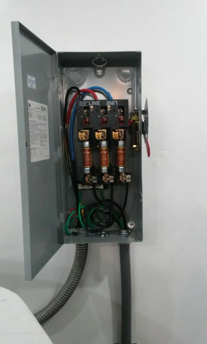 Three-phase disconnect switch installed for Smoke Detector Installation in Sea Cliff